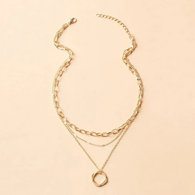 Gold necklace with chain and pendant in vintage style