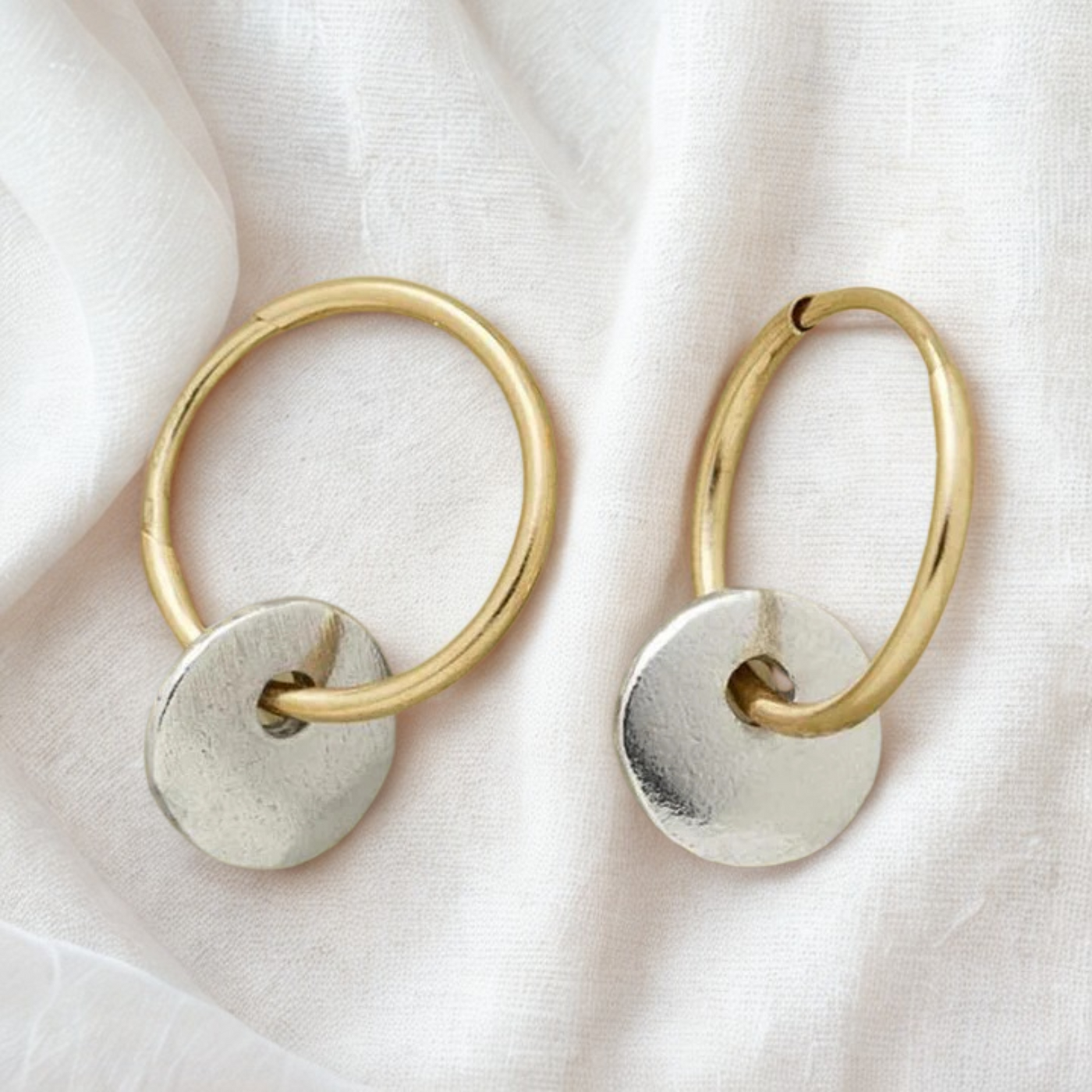 Gold-plated hoops and silver-plated earrings