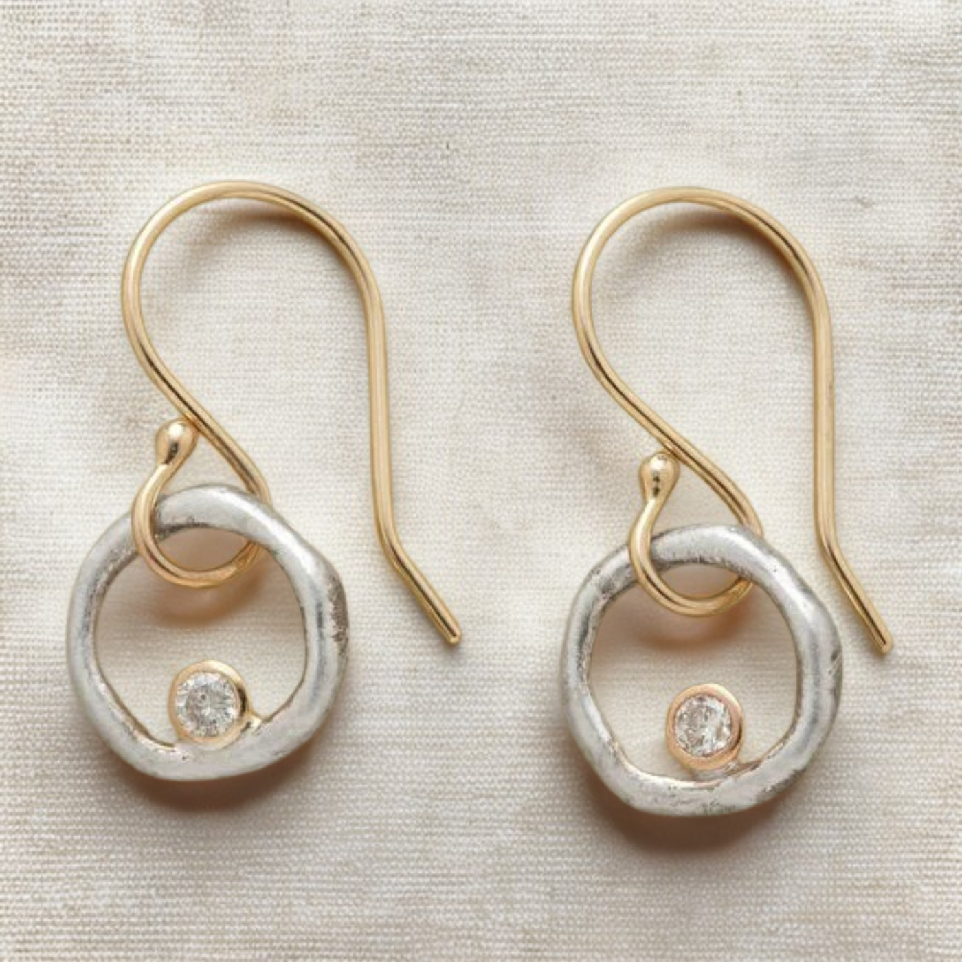 Gold and silver earrings with zirconia in vintage style