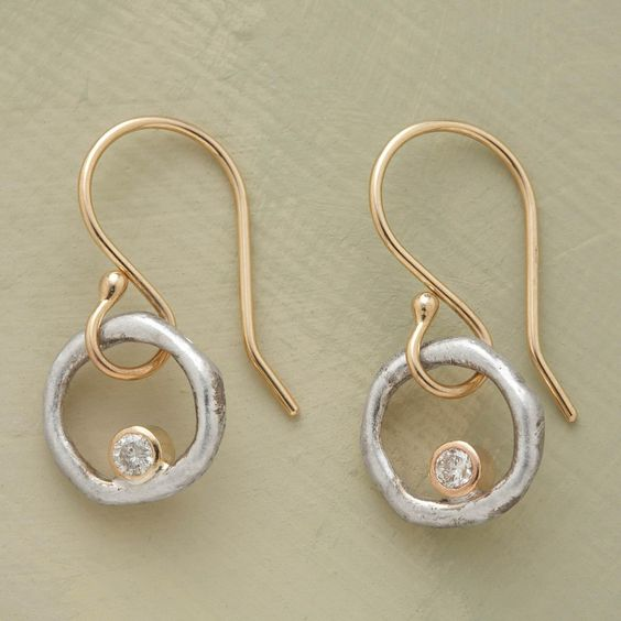 Gold and silver earrings with zirconia in vintage style